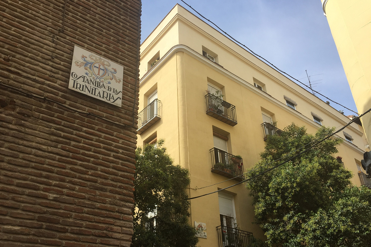 Tiled street sign in central Madrid, showing Costanilla de la Trinitaria.