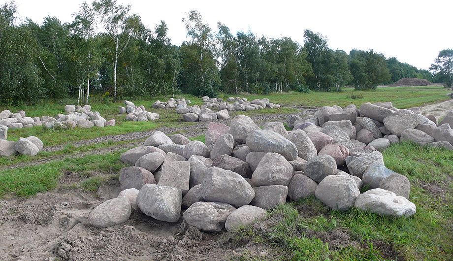 Decorative boulders, awaiting tedious redistribution by landscape architects.